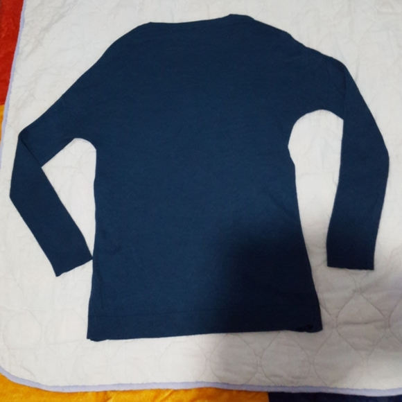 Blue cozy sweater with button up sides. - Picture 2 of 3
